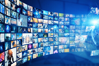 Digital wall displaying multiple screens with diverse video thumbnails and streaming content, arranged in a curved layout representing multi-format media distribution