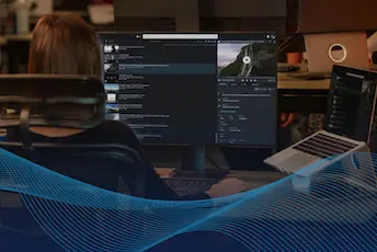 mimir news workflow operator looking at computer screen